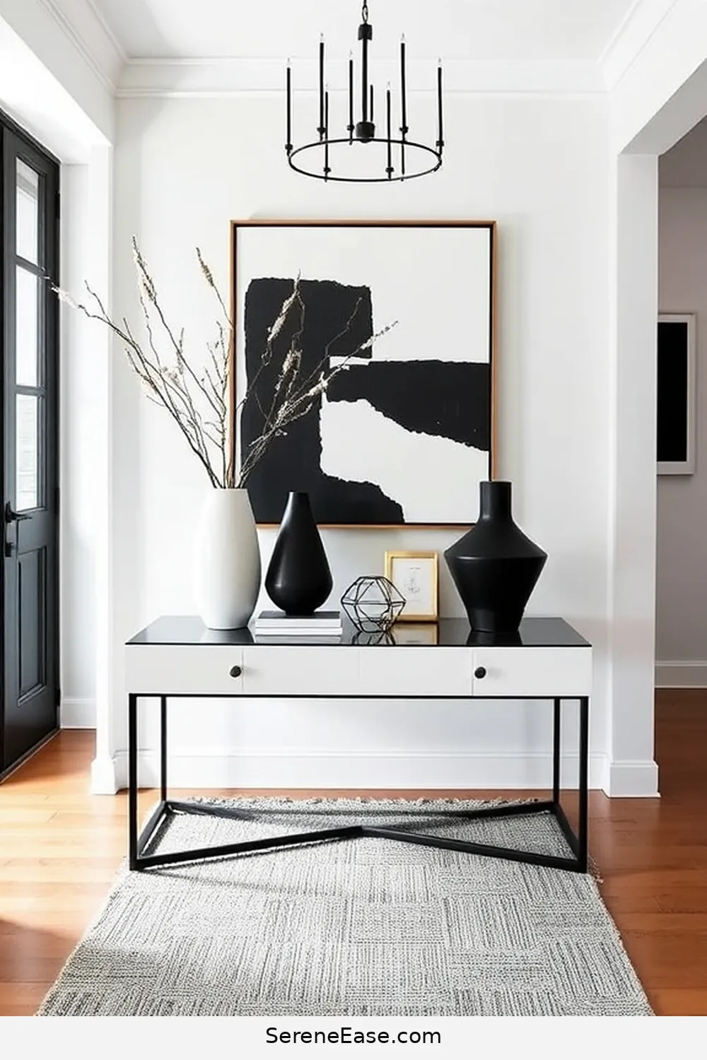 Create a Black and White Entryway Table Arrangement for 21 Ways to Incorporate Black and White Style in a Mid-Century Modern Hallway